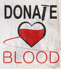 donate blood sign with wood grain texture