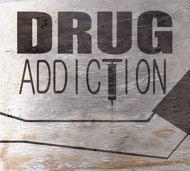 drug addiction sign with wood texture