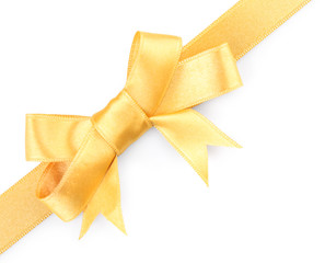Fototapeta premium Satin peach ribbon bow isolated on white