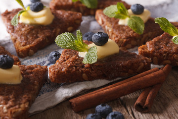 cinnamon toast with blueberries and mint macro. horizontal
