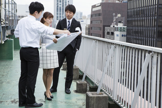 Businessman, has seen the drawing in building rooftop