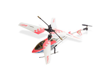 Fototapeta na wymiar Toy model helicopter on a light background