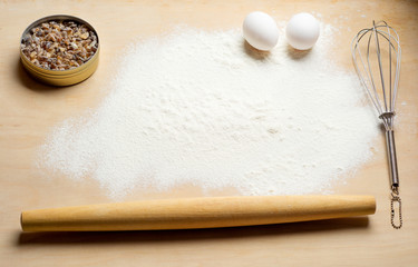Fototapeta na wymiar baking background with flour and eggs. Top view. 