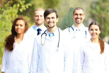 Happy young medics, outdoors