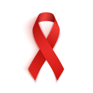 Red AIDS ribbon isolated on white background.