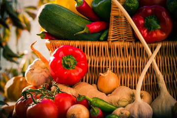 Colorful vegetables basket wooden table
