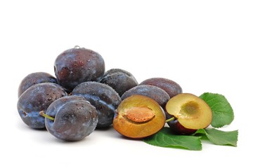 Fresh plums isolated on white background. 
