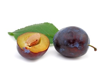 Fresh plums isolated on white background. 