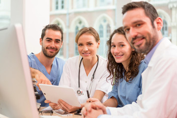 Medical team working at the hospital all together