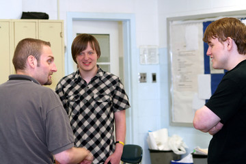 Obraz premium Teacher In Casual Discussion With Students