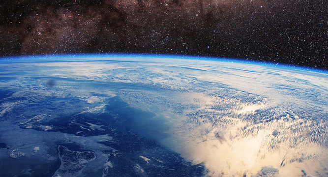 Our earth with star field in background - Elements of this image furnished by NASA