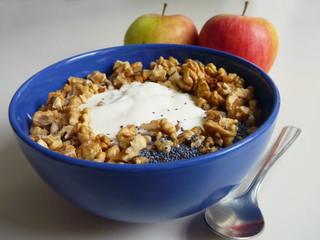 Blue bowl with yogurt and nuts