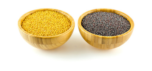 Macro of contrasting yellow and black mustard seeds
