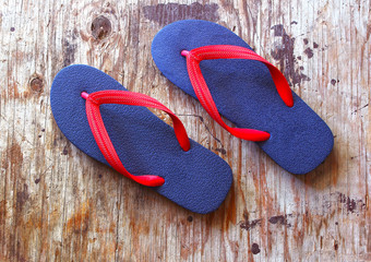 flip flop sandals on wood background