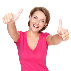 Portrait of a beautiful adult happy woman with thumbs up sign