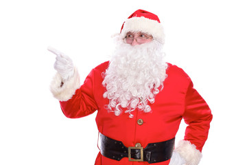 Kind Santa Claus pointing in white blank sign, isolated on white background