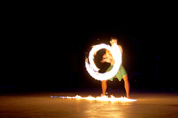 Fire dancer performing traditional dance in Fiji