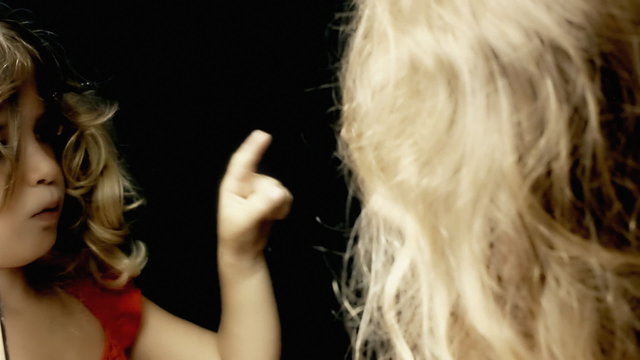 Little girl mirror smirking discover