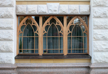 wooden arch windows of the stone house