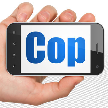 Law concept: Hand Holding Smartphone with Cop on display