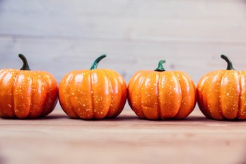 Pumpkin ornaments on desk