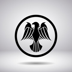 Silhouette of an eagle in a circle