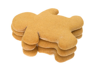 Stack of gingerbread men on a white background
