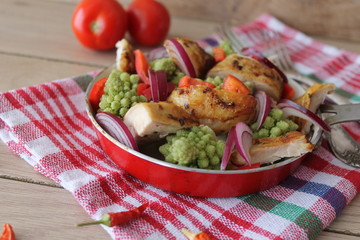 Salad with chicken, broccoli, onions and peppers with balsamic dressing