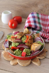 Salad with chicken, broccoli, onions and peppers with balsamic dressing