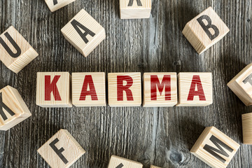 Wooden Blocks with the text: Karma