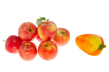 Red ripe apples and sweet pepper on a white background