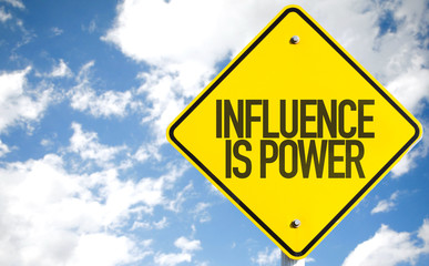 Influence is Power sign with sky background