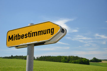 the german word "Mitbestimmung" on a road sign