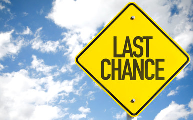 Last Chance sign with sky background