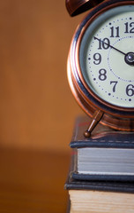 Alarm clock and book.