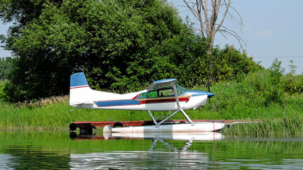 seaplane docked on the river