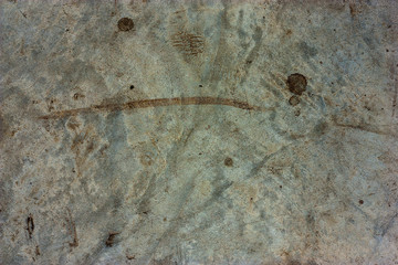 Textured walls with dirt.