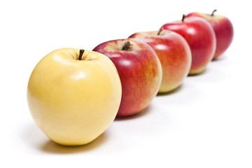 Group of ripe apples on a white background
