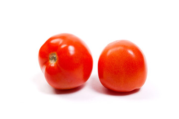 Ripe tomatoes isolated on white