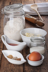 ingredients and tools to make a gingerbread cookies.