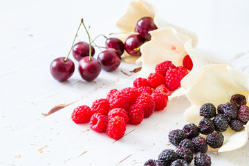 Selection of berries in waffle cones