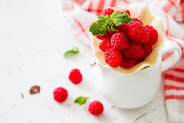 Raspberries in waffle cone