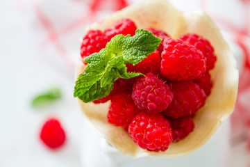Raspberries in waffle cone