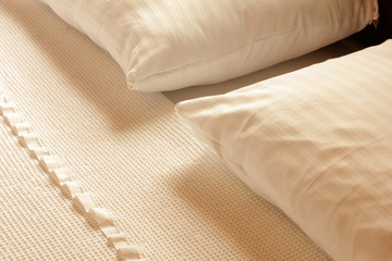 White bed sheets and pillows