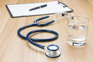 Fototapeta premium Stethoscope in doctors desk