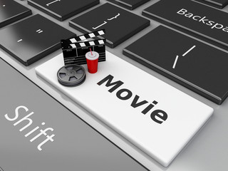 Naklejka premium 3d Clapper board with Film reel on computer keyboard.