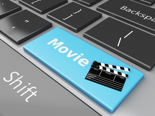 Naklejka premium 3d Cinema Clapper board on computer keyboard.