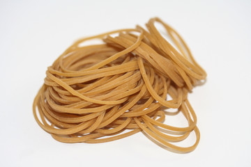 Pile of brown rubber bands.