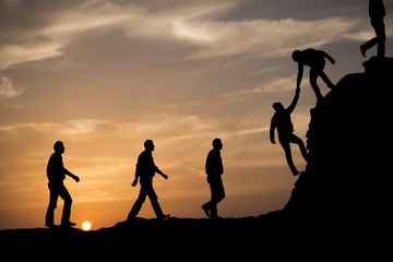Silhouette of helping hand.
