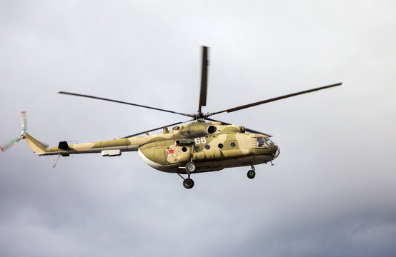 Russian army Mi-8 helicopter in action against cloudy sky
